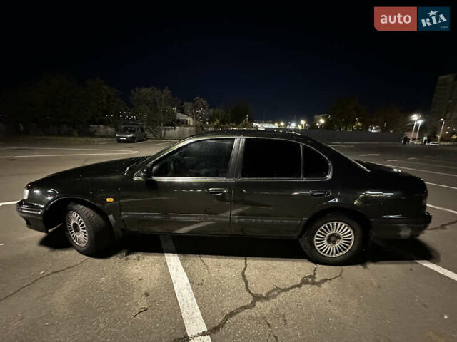 Зеленый Ниссан Максима, объемом двигателя 2 л и пробегом 280 тыс. км за 2400 $, фото 2 на Automoto.ua