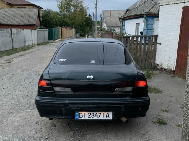 Зеленый Ниссан Максима, объемом двигателя 2 л и пробегом 444 тыс. км за 1500 $, фото 2 на Automoto.ua