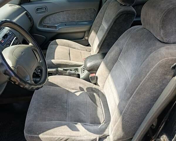 Зелений Ніссан Максіма, об'ємом двигуна 2.99 л та пробігом 435 тис. км за 2999 $, фото 13 на Automoto.ua