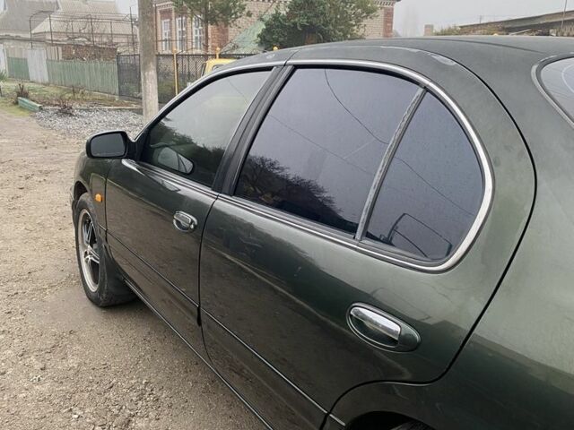 Зеленый Ниссан Максима, объемом двигателя 3 л и пробегом 220 тыс. км за 2700 $, фото 5 на Automoto.ua