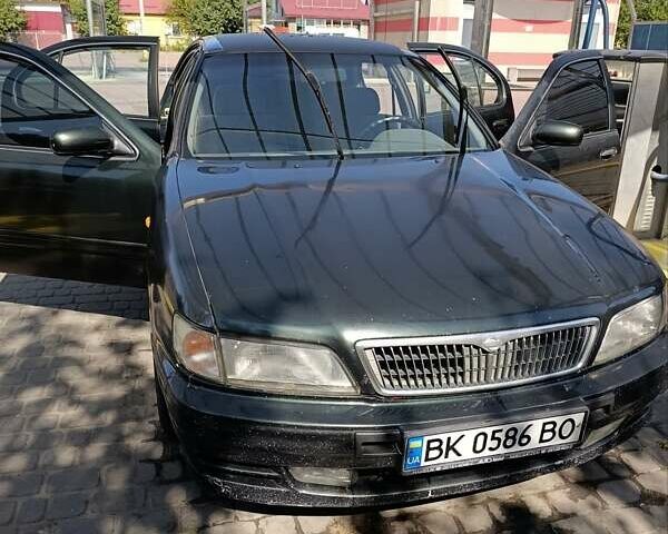 Зелений Ніссан Максіма, об'ємом двигуна 2.99 л та пробігом 435 тис. км за 2999 $, фото 2 на Automoto.ua