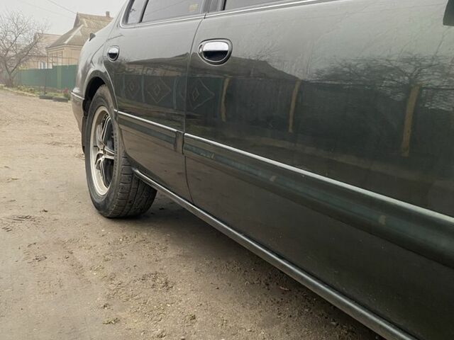 Зеленый Ниссан Максима, объемом двигателя 3 л и пробегом 220 тыс. км за 2700 $, фото 6 на Automoto.ua