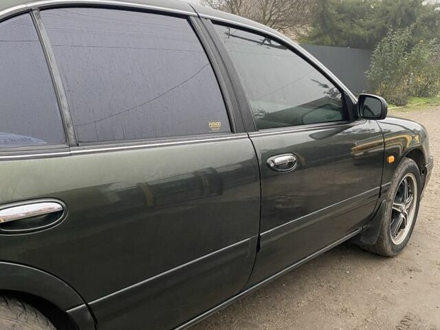 Зеленый Ниссан Максима, объемом двигателя 3 л и пробегом 220 тыс. км за 2700 $, фото 4 на Automoto.ua