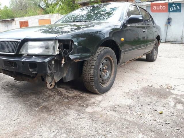 Зеленый Ниссан Максима, объемом двигателя 3 л и пробегом 327 тыс. км за 1670 $, фото 8 на Automoto.ua