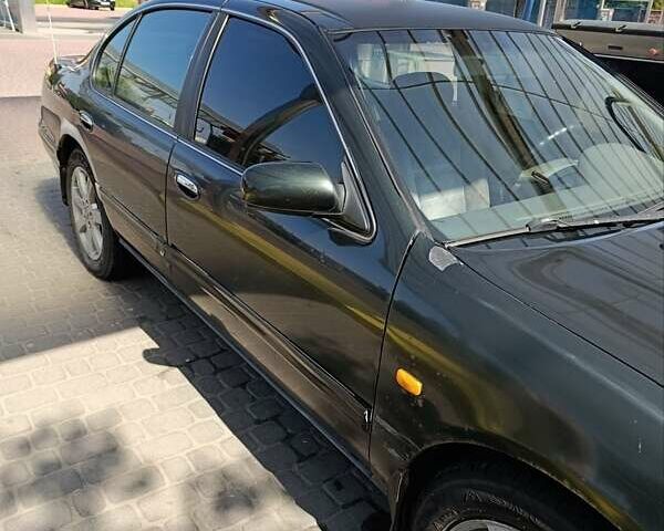 Зелений Ніссан Максіма, об'ємом двигуна 2.99 л та пробігом 435 тис. км за 2999 $, фото 3 на Automoto.ua