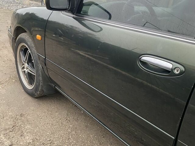 Зеленый Ниссан Максима, объемом двигателя 3 л и пробегом 220 тыс. км за 2700 $, фото 7 на Automoto.ua