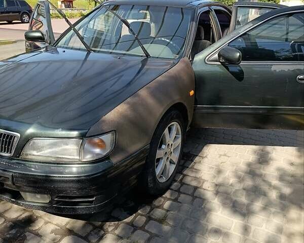 Зелений Ніссан Максіма, об'ємом двигуна 2.99 л та пробігом 435 тис. км за 2999 $, фото 8 на Automoto.ua