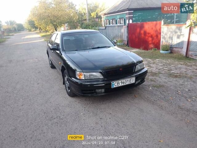 Зеленый Ниссан Максима, объемом двигателя 3 л и пробегом 491 тыс. км за 3700 $, фото 2 на Automoto.ua