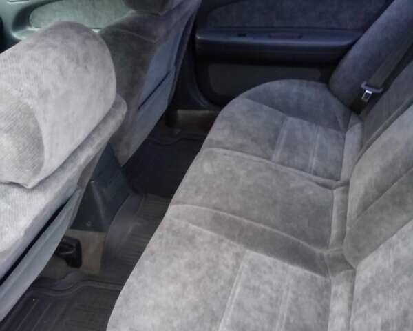 Зеленый Ниссан Максима, объемом двигателя 3 л и пробегом 327 тыс. км за 1670 $, фото 2 на Automoto.ua