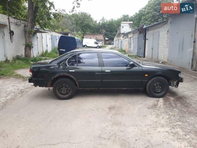 Зеленый Ниссан Максима, объемом двигателя 3 л и пробегом 327 тыс. км за 1670 $, фото 7 на Automoto.ua