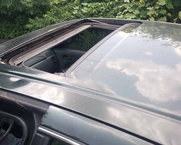 Зелений Ніссан Максіма, об'ємом двигуна 2.99 л та пробігом 381 тис. км за 2100 $, фото 9 на Automoto.ua