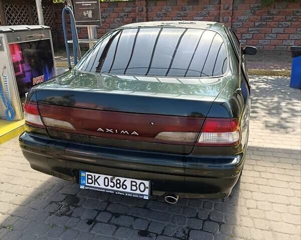 Зелений Ніссан Максіма, об'ємом двигуна 2.99 л та пробігом 435 тис. км за 2999 $, фото 12 на Automoto.ua