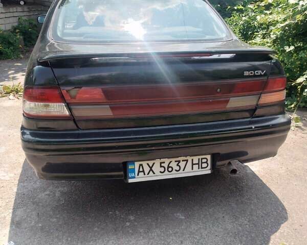 Зелений Ніссан Максіма, об'ємом двигуна 2.99 л та пробігом 381 тис. км за 2100 $, фото 2 на Automoto.ua