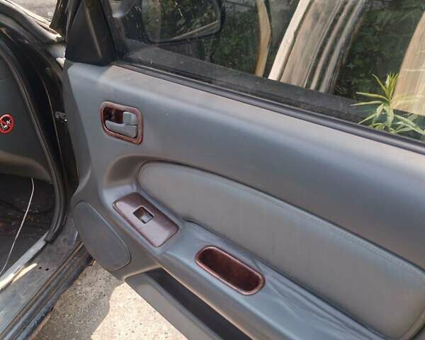 Зелений Ніссан Максіма, об'ємом двигуна 2.99 л та пробігом 381 тис. км за 2100 $, фото 4 на Automoto.ua