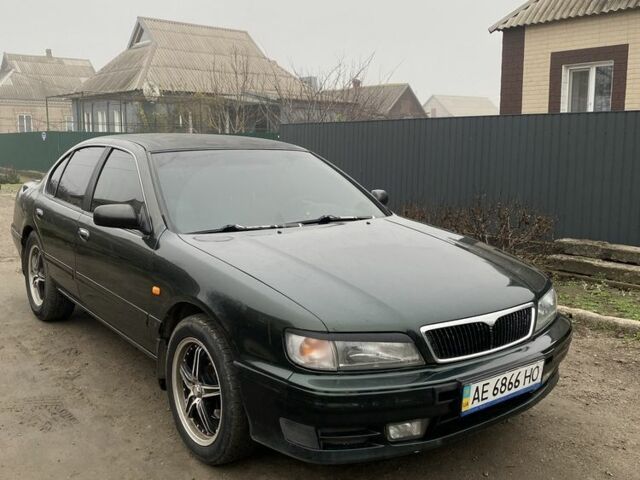 Зеленый Ниссан Максима, объемом двигателя 3 л и пробегом 220 тыс. км за 2700 $, фото 1 на Automoto.ua