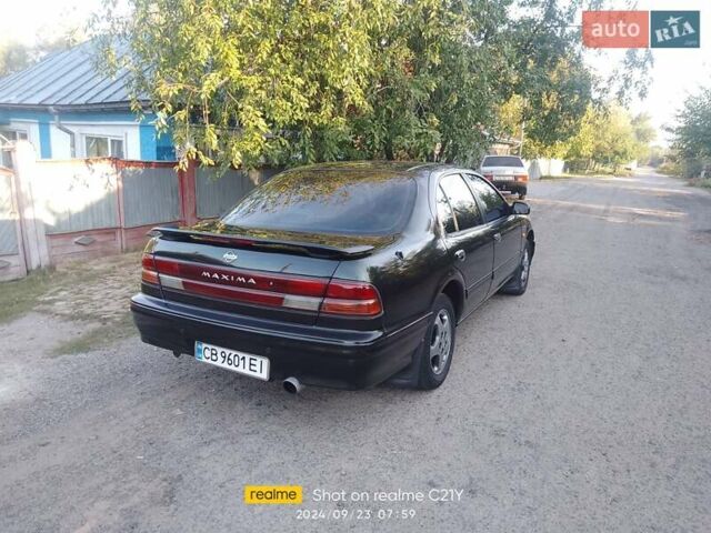 Зеленый Ниссан Максима, объемом двигателя 3 л и пробегом 491 тыс. км за 3700 $, фото 6 на Automoto.ua