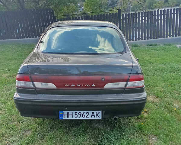 Зеленый Ниссан Максима, объемом двигателя 2 л и пробегом 484 тыс. км за 3500 $, фото 2 на Automoto.ua