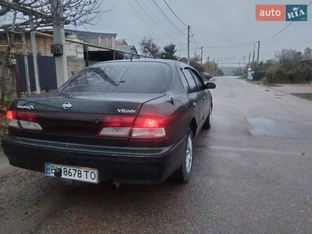 Зелений Ніссан Максіма, об'ємом двигуна 2.99 л та пробігом 340 тис. км за 2150 $, фото 9 на Automoto.ua