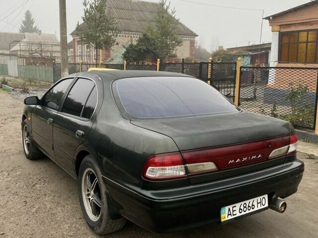 Зеленый Ниссан Максима, объемом двигателя 3 л и пробегом 220 тыс. км за 2700 $, фото 3 на Automoto.ua