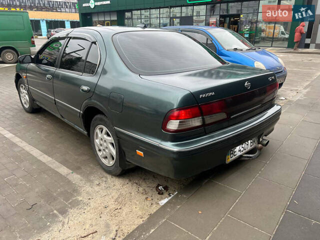 Зелений Ніссан Максіма, об'ємом двигуна 2 л та пробігом 470 тис. км за 1999 $, фото 4 на Automoto.ua