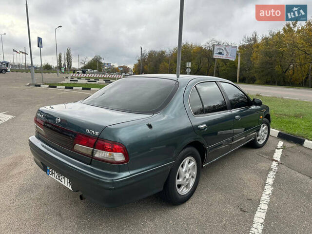 Зеленый Ниссан Максима, объемом двигателя 3 л и пробегом 326 тыс. км за 3700 $, фото 4 на Automoto.ua