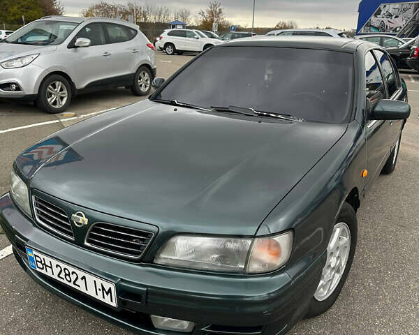 Зеленый Ниссан Максима, объемом двигателя 3 л и пробегом 326 тыс. км за 3700 $, фото 1 на Automoto.ua