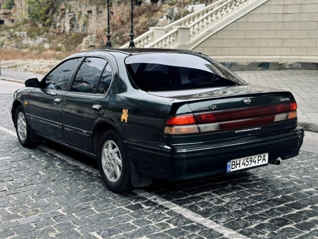 Зеленый Ниссан Максима, объемом двигателя 3 л и пробегом 250 тыс. км за 2200 $, фото 3 на Automoto.ua
