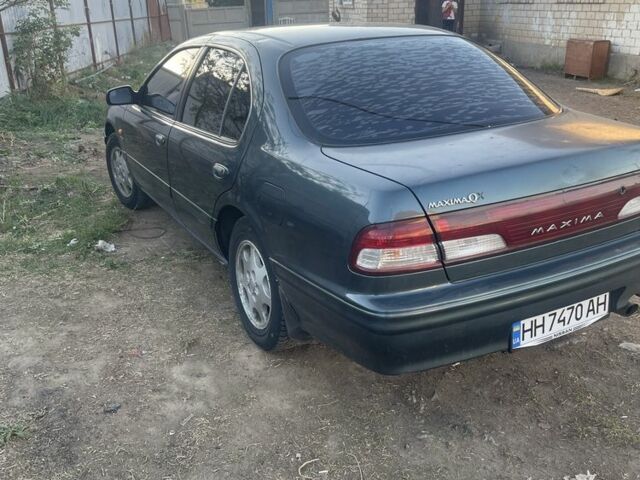 Зеленый Ниссан Максима, объемом двигателя 3 л и пробегом 258 тыс. км за 2450 $, фото 1 на Automoto.ua