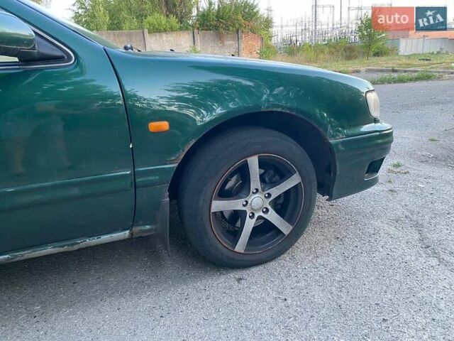 Зелений Ніссан Максіма, об'ємом двигуна 2.99 л та пробігом 350 тис. км за 1900 $, фото 5 на Automoto.ua