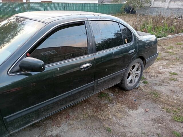 Зеленый Ниссан Максима, объемом двигателя 3 л и пробегом 250 тыс. км за 2000 $, фото 2 на Automoto.ua