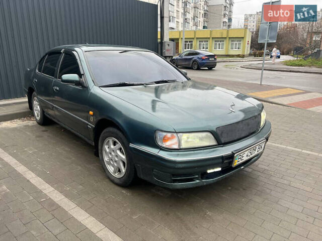 Зелений Ніссан Максіма, об'ємом двигуна 2 л та пробігом 470 тис. км за 1999 $, фото 1 на Automoto.ua