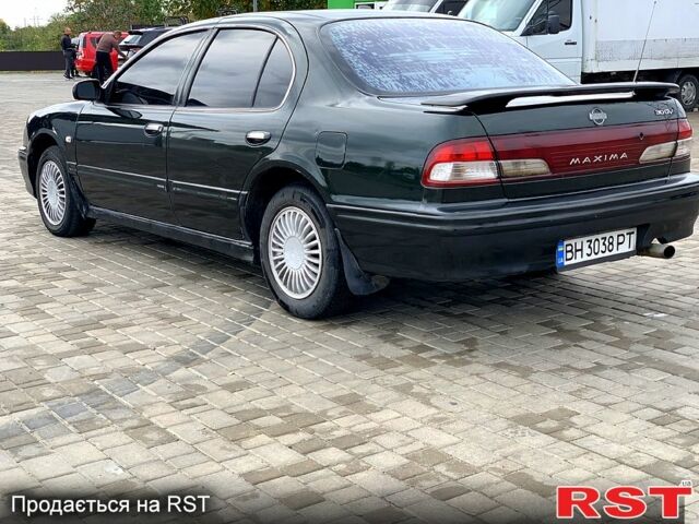 Зелений Ніссан Максіма, об'ємом двигуна 3 л та пробігом 453 тис. км за 2100 $, фото 1 на Automoto.ua