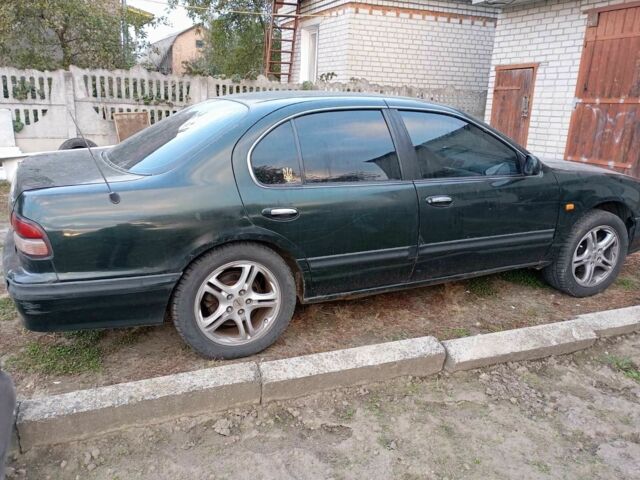 Зеленый Ниссан Максима, объемом двигателя 3 л и пробегом 250 тыс. км за 2000 $, фото 3 на Automoto.ua