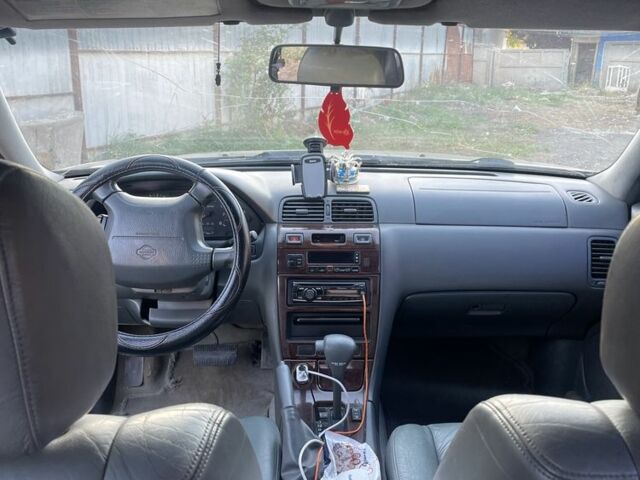 Зеленый Ниссан Максима, объемом двигателя 3 л и пробегом 258 тыс. км за 2450 $, фото 5 на Automoto.ua