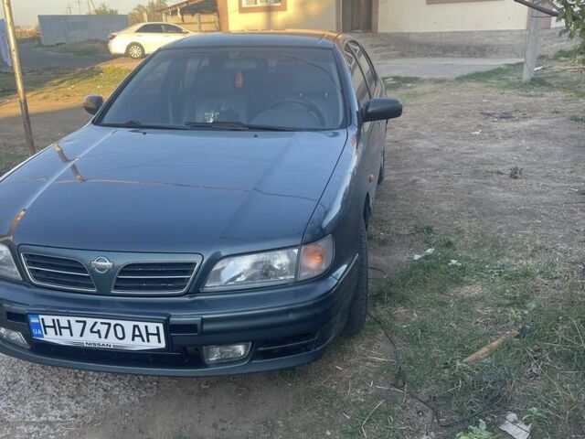 Зеленый Ниссан Максима, объемом двигателя 3 л и пробегом 258 тыс. км за 2450 $, фото 3 на Automoto.ua