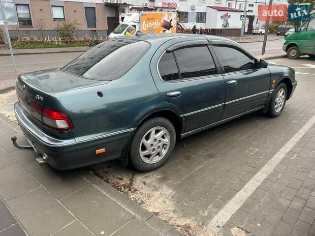 Зелений Ніссан Максіма, об'ємом двигуна 2 л та пробігом 470 тис. км за 1999 $, фото 5 на Automoto.ua