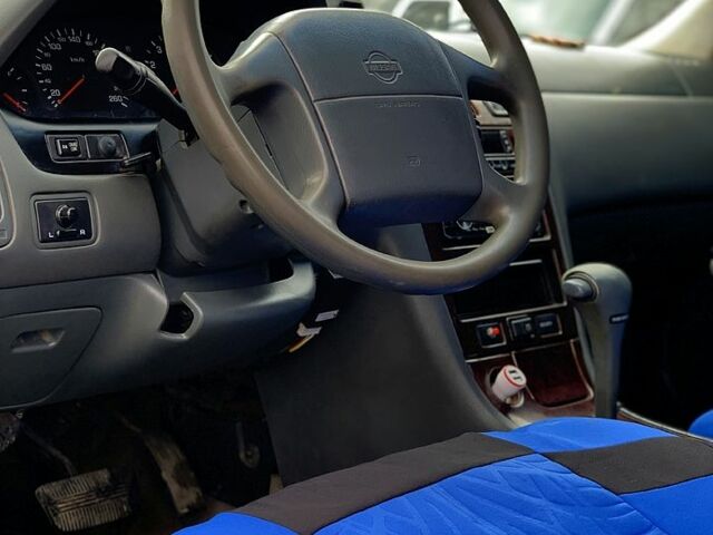 Зелений Ніссан Максіма, об'ємом двигуна 3 л та пробігом 453 тис. км за 2100 $, фото 2 на Automoto.ua