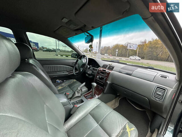 Зеленый Ниссан Максима, объемом двигателя 3 л и пробегом 326 тыс. км за 3700 $, фото 9 на Automoto.ua