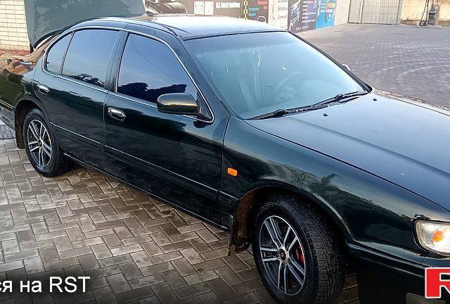 Зеленый Ниссан Максима, объемом двигателя 3 л и пробегом 250 тыс. км за 3700 $, фото 2 на Automoto.ua