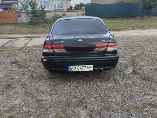 Зеленый Ниссан Максима, объемом двигателя 3 л и пробегом 300 тыс. км за 2600 $, фото 3 на Automoto.ua
