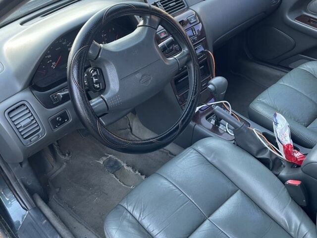 Зеленый Ниссан Максима, объемом двигателя 3 л и пробегом 258 тыс. км за 2450 $, фото 6 на Automoto.ua