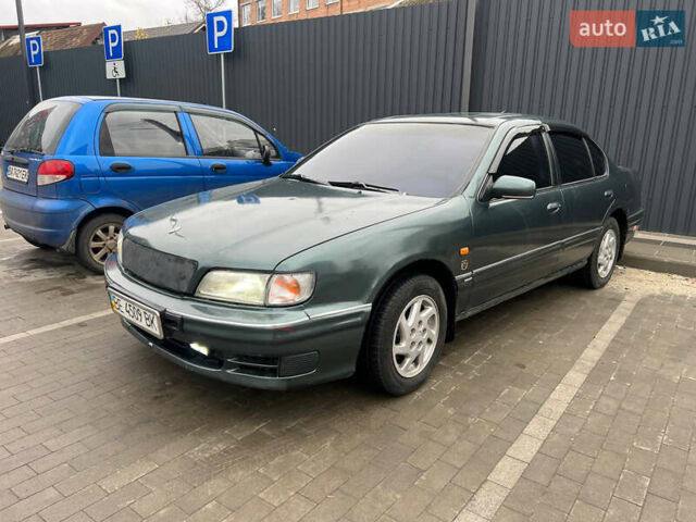 Зелений Ніссан Максіма, об'ємом двигуна 2 л та пробігом 470 тис. км за 1999 $, фото 2 на Automoto.ua