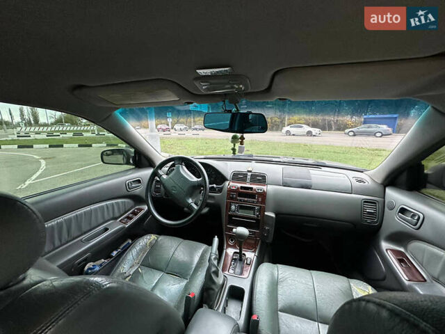 Зеленый Ниссан Максима, объемом двигателя 3 л и пробегом 326 тыс. км за 3700 $, фото 7 на Automoto.ua