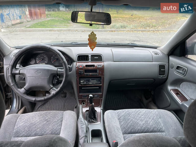 Ниссан Максима 1999 в Киеве на Automoto.ua Зеленый Ниссан Максима, объемом двигателя 2 л и пробегом 340 тыс. км за 1900 $, фото 11 на Automoto.ua