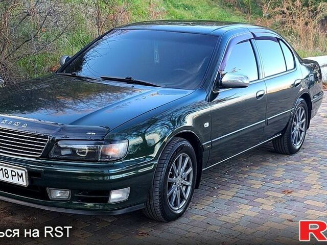 Зеленый Ниссан Максима, объемом двигателя 3 л и пробегом 384 тыс. км за 4780 $, фото 3 на Automoto.ua