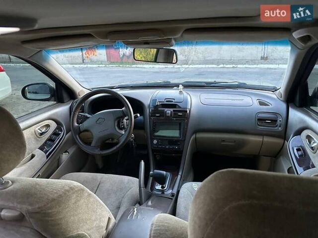 Зелений Ніссан Максіма, об'ємом двигуна 3 л та пробігом 487 тис. км за 3900 $, фото 22 на Automoto.ua