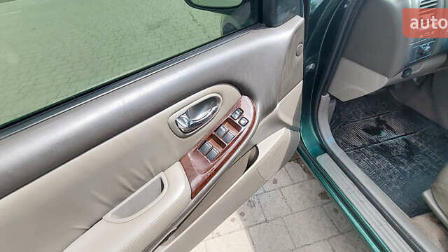 Зеленый Ниссан Максима, объемом двигателя 2 л и пробегом 298 тыс. км за 2998 $, фото 11 на Automoto.ua