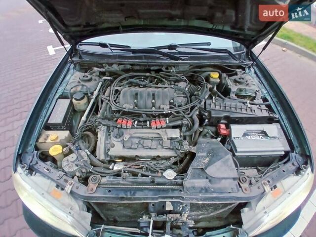 Зелений Ніссан Максіма, об'ємом двигуна 2.99 л та пробігом 427 тис. км за 3000 $, фото 22 на Automoto.ua