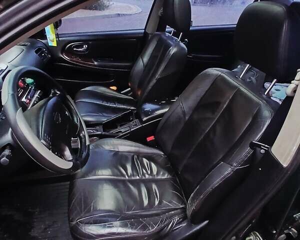 Зелений Ніссан Максіма, об'ємом двигуна 2.99 л та пробігом 427 тис. км за 3000 $, фото 7 на Automoto.ua