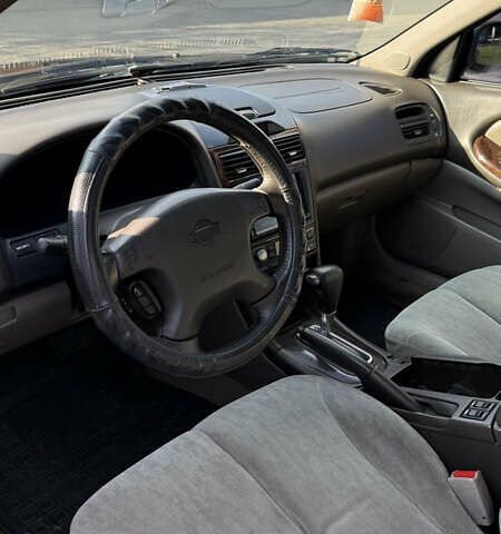 Зеленый Ниссан Максима, объемом двигателя 2 л и пробегом 560 тыс. км за 4000 $, фото 9 на Automoto.ua